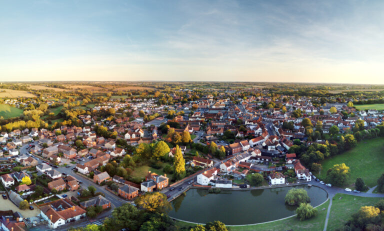 Aerial view of fishing pond in Great Dunmow, Essex - near Bishops Stortford. Autumn Sunset.