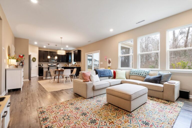 Stylish, clutter-free living room showing how to help a home stand out in a competitive market