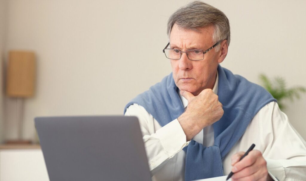 Landlord reviewing rental documents and preparing a Section 13 rent increase notice under the Renters’ Rights Act 2025