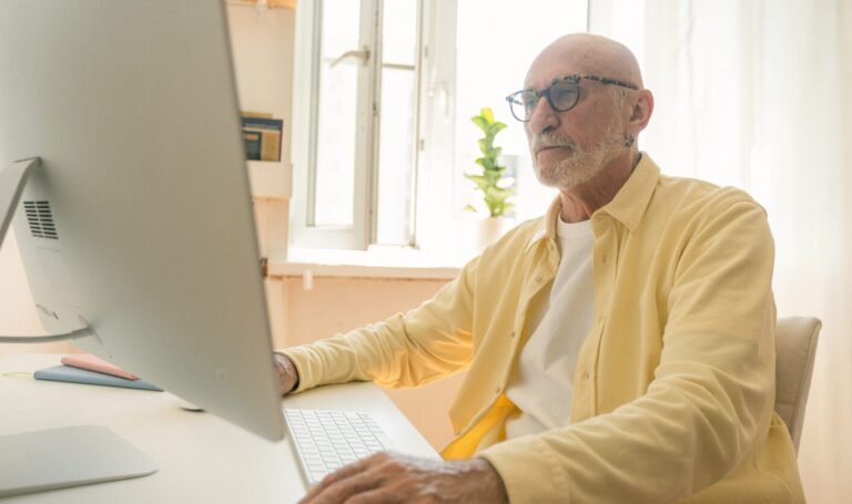 Landlord reviewing tenant referencing documents at home